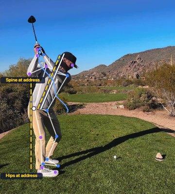 The example golfer at the top of the backswing.