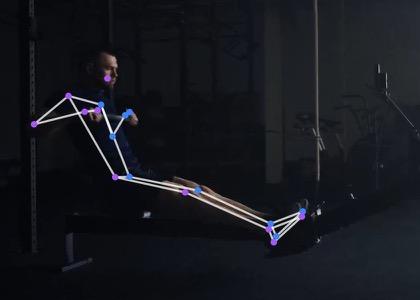 The same rower at the finish, legs flat, body leaning back and the handle drawn into the body.
